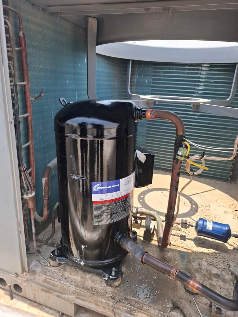 AC Repair near me technician fixing a unit in Palm Jumeirah jable aliDubai